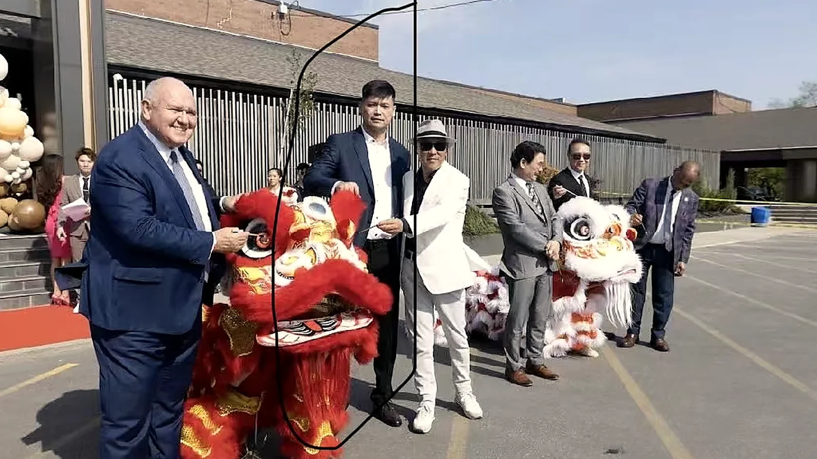 A lion dancer greeting guests at the inaugural Canada-China Culinary Exchange